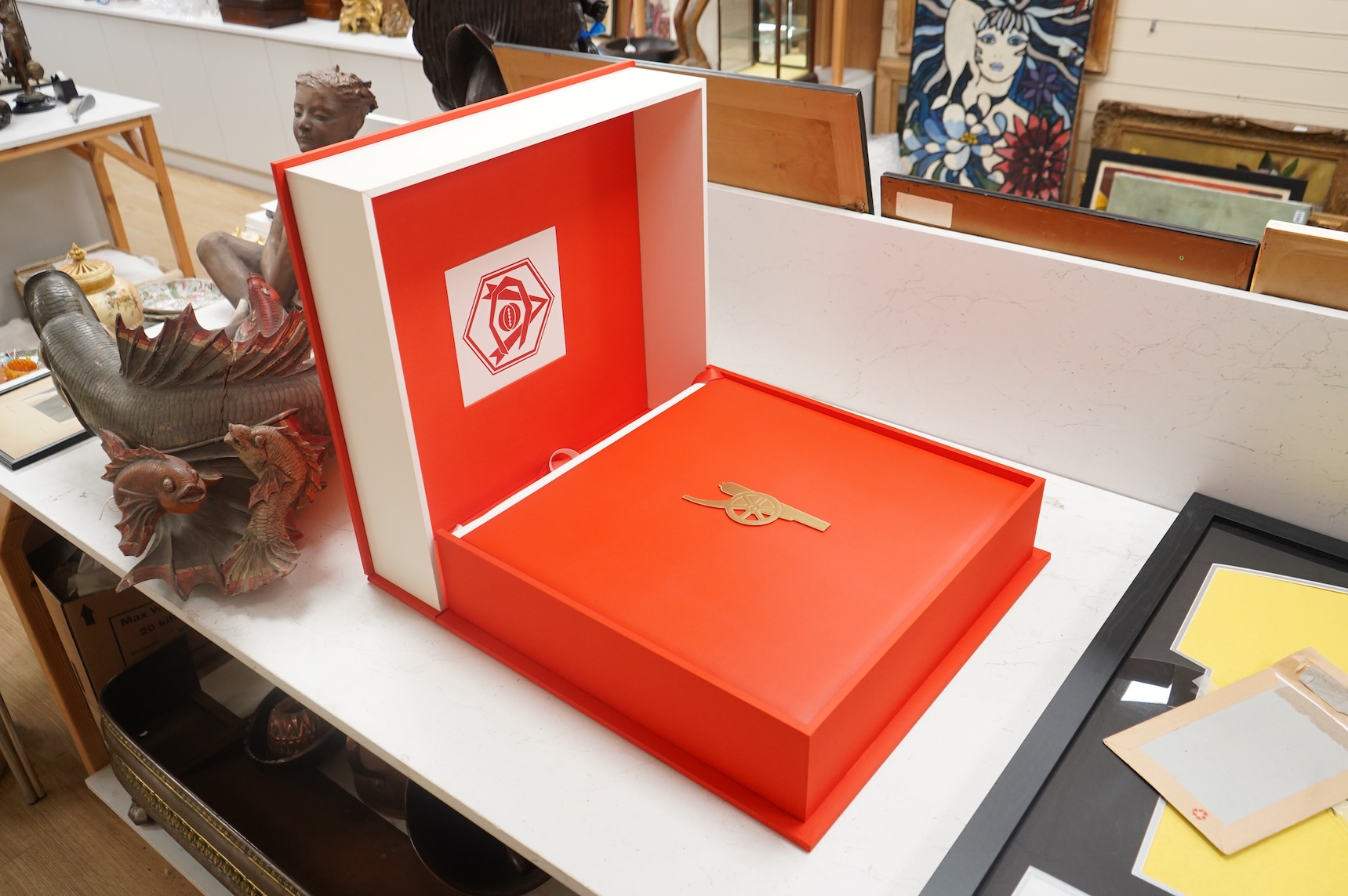 An Arsenal Opus, Icons Edition #47 in a series of 500, signed by Arsene Wenger, Tony Adams, Patrick Vieira, Dennis Bergkamp, Charlie George, Bob Wilson, Frank Mclintock, Thierry Henry, George Graham, Liam Brady, David Se